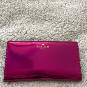 Kate Spade hot pink wallet with 13 card slots and pocket for coins. Barely used